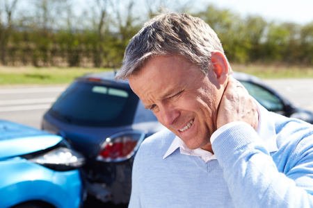 Man with neck pain after a rear-end car accident